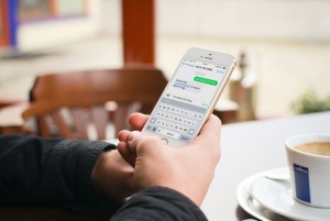 Employee-providing-sms-customer-service-from home