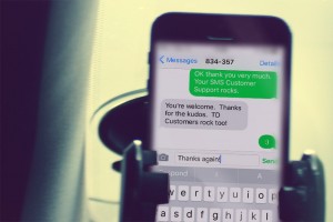 Employee-providing-sms-customer-service-from home